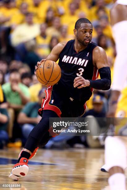 Dwyane Wade of the Miami Heat brings the ball up the floor against the Indiana Pacers during Game Five of the Eastern Conference Finals of the 2014...