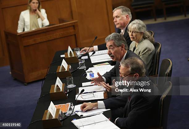 Top to bottom, National Security Agency Deputy Director Richard Ledgett, Principal Deputy Director of National Intelligence Stephanie O'Sullivan,...