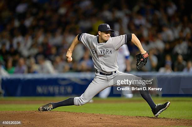 Relief pitcher Preston Claiborne of the New York Yankees delivers a pitch during the seventh inning against the Chicago Cubs at Wrigley Field on May...