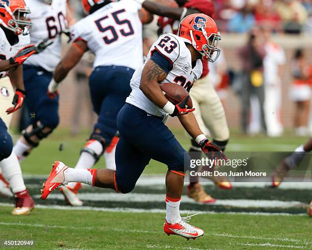 Running back Prince-Tyson Gulley of the Syracuse Orange makes a running play during the game against the Florida State Seminoles at Doak Campbell...