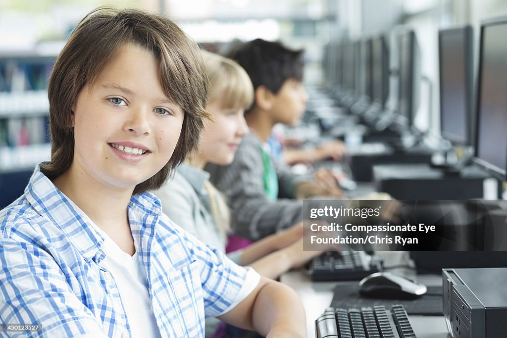 Students using computers in classroom