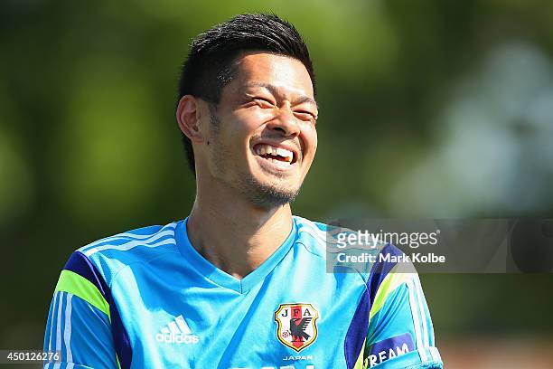 Hotaru Yamaguchi laughs during a Japan training session at North Greenwood Recreation & Aquatic Complex on June 5, 2014 in Clearwater, Florida.