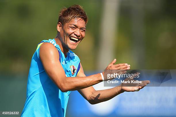Yoshito Okubo laughs during a Japan training session at North Greenwood Recreation & Aquatic Complex on June 5, 2014 in Clearwater, Florida.