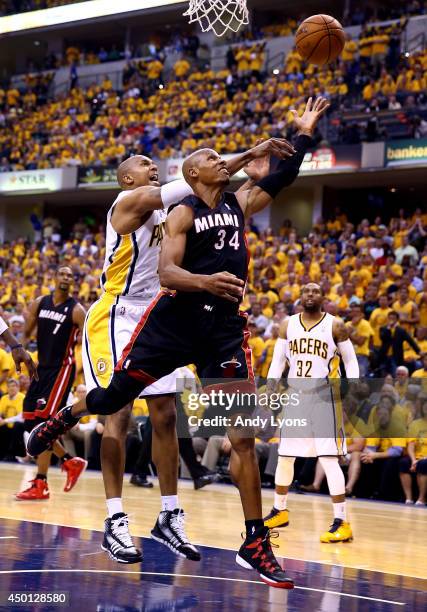 Ray Allen of the Miami Heat drives to the basket as David West of the Indiana Pacers defends during Game Five of the Eastern Conference Finals of the...