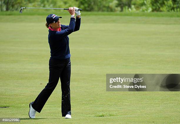 Cristie Kerr hits her approach shot on the 16th hole during the first round of the Manulife Financial LPGA Classic at the Grey Silo Golf Course on...