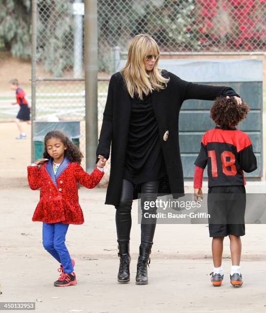 November 16: Heidi Klum and Lou Samuel with Johan Samuel are seen on November 16, 2013 in Los Angeles, California.