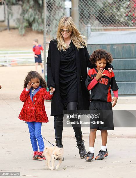 November 16: Heidi Klum and Lou Samuel with Johan Samuel are seen on November 16, 2013 in Los Angeles, California.