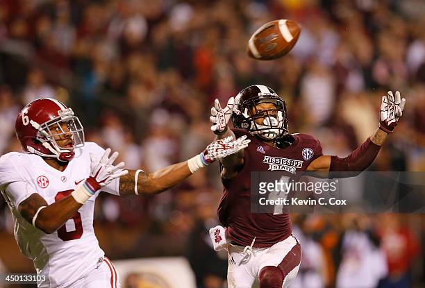 Ha Ha Clinton-Dix of the Alabama Crimson Tide intercepts a touchdown reception intended for Jameon Lewis of the Mississippi State Bulldogs at Davis...