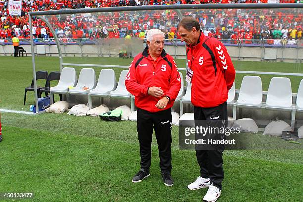 Roy Evans and Phil Thompson have a chat during the Legends match between Liverpool FC Legends and Kaizer Chiefs Legends at Moses Mabhida Stadium on...