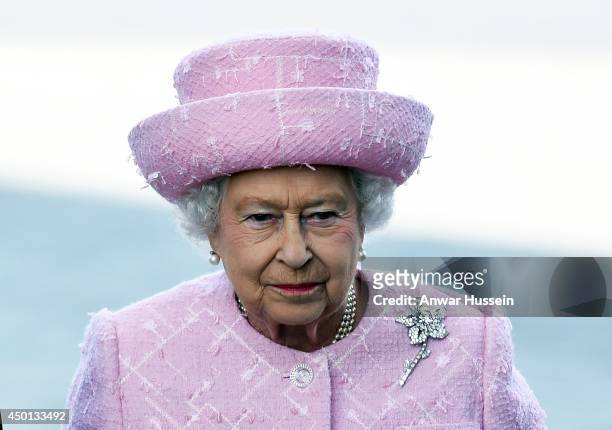 Queen Elizabeth ll attends a Welcoming Ceremony at The Arc de Triomphe on the first day of her State Visit to France on June 5, 2014 in Paris, France.