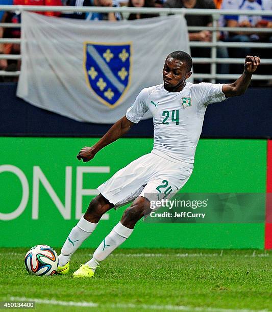Jean-Daniel Akpa Akpro of the Ivory Coast handles the ball against Bosnia-Herzegovina during the first half of a friendly match at Edward Jones Dome...