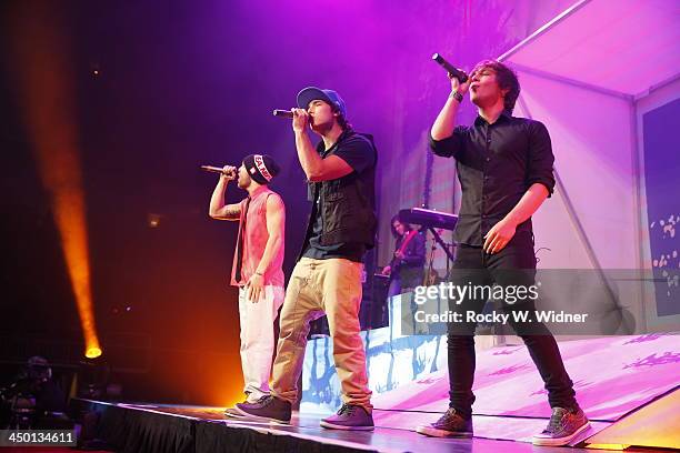 Drew Chadwick, Wesley Stromberg and Keaton Stromberg of Emblem3 perform in concert at the SAP Center on November 10, 2013 in San Jose, California.