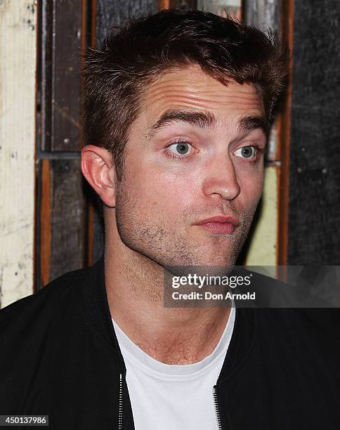 Robert Pattinson poses during a photo call for "The Rover" at Sydney Theatre on June 6, 2014 in Sydney, Australia.