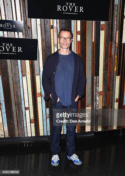 Guy Pearce poses during a photo call for "The Rover" at Sydney Theatre on June 6, 2014 in Sydney, Australia.
