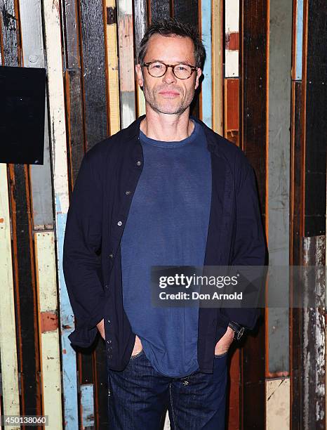 Guy Pearce poses during a photo call for "The Rover" at Sydney Theatre on June 6, 2014 in Sydney, Australia.