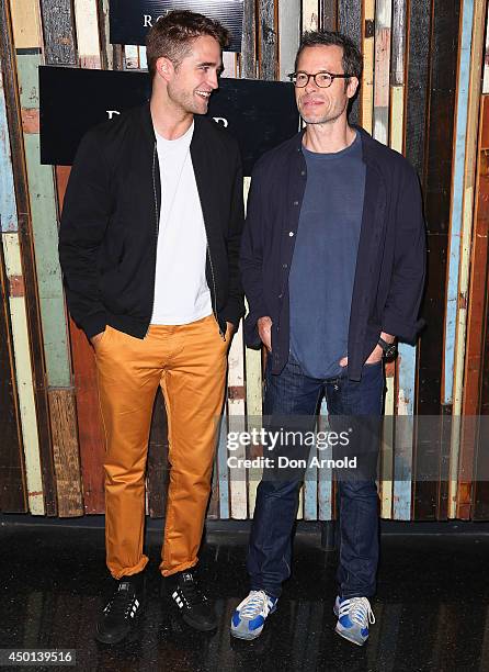 Robert Pattinson and Guy Pearce pose during a photo call for "The Rover" at Sydney Theatre on June 6, 2014 in Sydney, Australia.