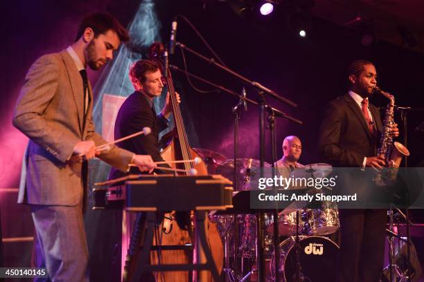 Lewis Wright, Tom Farmer, Shane Forbes and Nathaniel Facey of the band Empirical perform on stage at The South Bank Centre during day 2 of London...