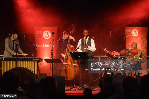 Lewis Wright, Tom Farmer, Nathaniel Facey and Shane Forbes of the band Empirical perform on stage at The South Bank Centre during day 2 of London...