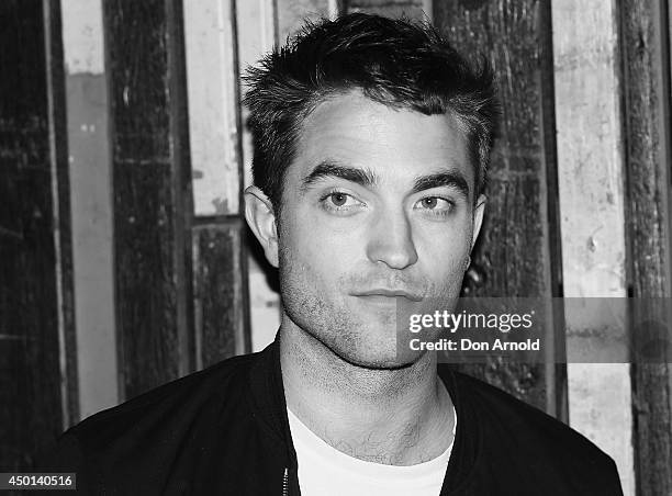 Robert Pattinson poses during a photo call for "The Rover" at Sydney Theatre on June 6, 2014 in Sydney, Australia.