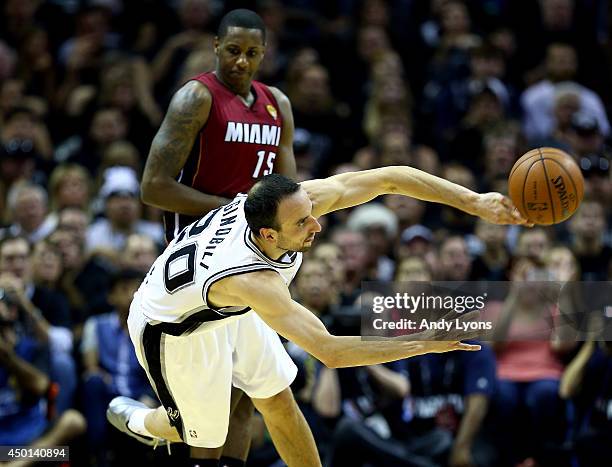 Manu Ginobili of the San Antonio Spurs makes a pass against the Miami Heat during Game One of the 2014 NBA Finals at the AT&T Center on June 5, 2014...