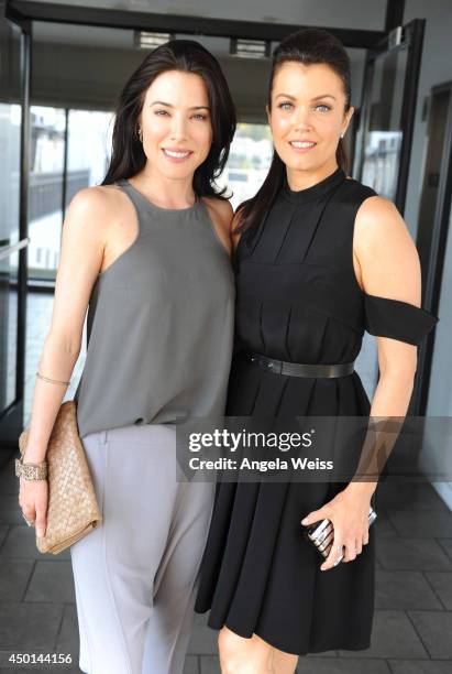 Actresses Jaime Murray and Bellamy Young attend TheWrap's First Annual Emmy Party - Inside at The London Hotel on June 5, 2014 in West Hollywood,...