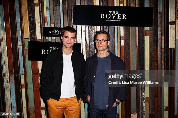 Robert Pattinson and Guy Pearce attend a photo call for "The Rover" as part of the Sydney Film Festival at Sydney Theatre on June 6, 2014 in Sydney,...