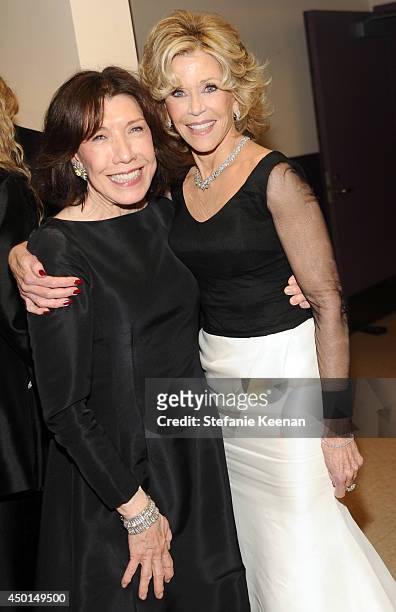 Actress Lily Tomlin and honoree Jane Fonda backstage during the 2014 AFI Life Achievement Award: A Tribute to Jane Fonda at the Dolby Theatre on June...