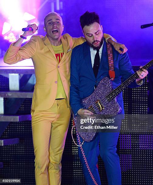 Frontman Tyler Glenn and bassist Branden Campbell of Neon Trees perform at The Boulevard Pool at the Cosmopolitan of Las Vegas as the band tours in...