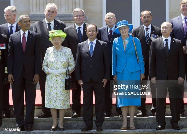 President Barack Obama, Queen Elizabeth of Britain, French President Francois Hollande, Queen Margrethe of Denmark and Russian President Vladimir...