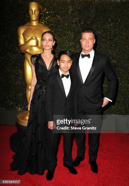 Angelina Jolie, Maddox Jolie-Pitt and Brad Pitt arrives at the The Board Of Governors Of The Academy Of Motion Picture Arts And Sciences' Governor...