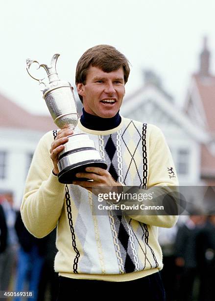 Nick Faldo of England with The Claret Jug the Open Championship trophy after his win by one shot over Paul Azinger and Rodger Davis the 116th Open...