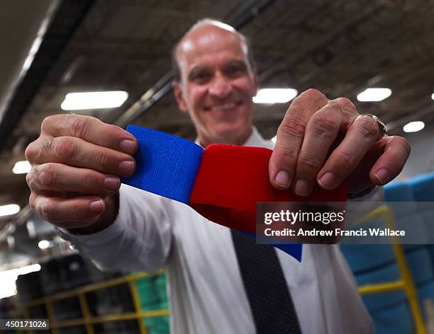 Velcro turns 50 this year. Plant Manager Peter Buchanan with his produce at the company's Brampton headquarters. June 4, 2014.