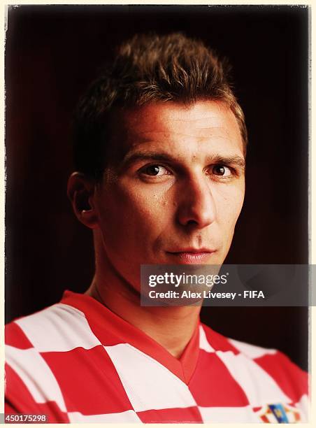 Mario Mandzukic of Croatia poses during the official FIFA World Cup 2014 portrait session on June 5, 2014 in Salvador, Brazil.