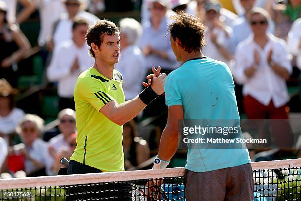 Andy Murray of Great Britain shakes hands with Rafael Nadal of Spain after their men's singles match on day thirteen of the French Open at Roland...