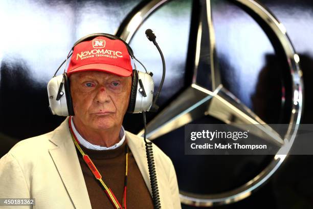 Niki Lauda, non-executive chairman of Mercedes GP watches the action from the Mercedes garage during practice ahead of the Canadian Formula One Grand...