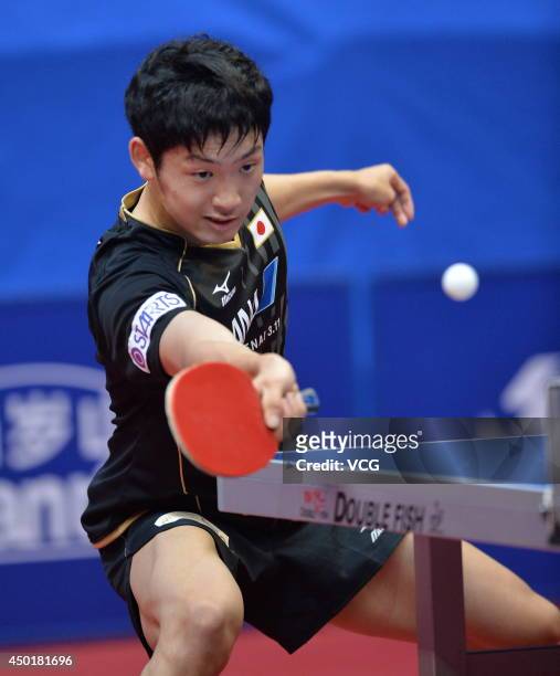 Yuto Muramatsu of Japan competes in his Men's Singles first round match against Chen Chien-An of Chinese Taipei on day three of 2014 ITTF World Tour...