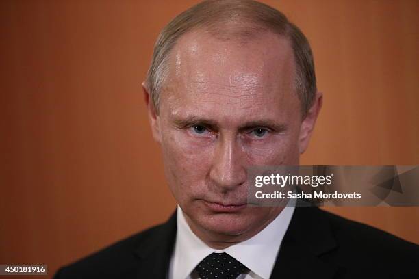 Russian President Vladimir Putin speeches during his press conference in the Barriere Normandy Hotel on June 6, 2014 in Deauville, France. Putin...