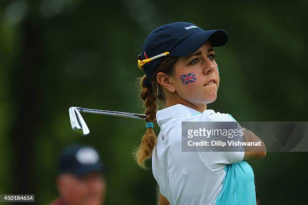 Georgia Hall of Great Britain and Ireland watches her tee shot on the 12th hole during the 38th Curtis Cup match at the St. Louis Country Club in St....