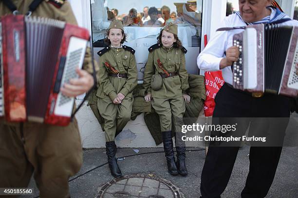 Russian military re-enactors take part in the 70th anniversary of the D-Day landings on June 6, 2014 in Arromanches Les Bains, France. Friday 6th...