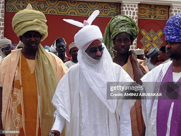 Nigeria's former Governor of the Central Bank of Nigeria and potential heir to the Kano emirate, Sanusi Lamido Sanusi , arrives at the royal palace...