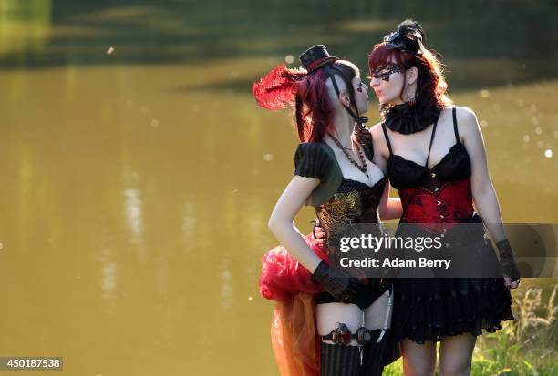 Gothic enthusiasts pose during the annual Wave-Gotik-Treffen music festival on June 6, 2014 in Leipzig, Germany. The event began in the 1990s and has...