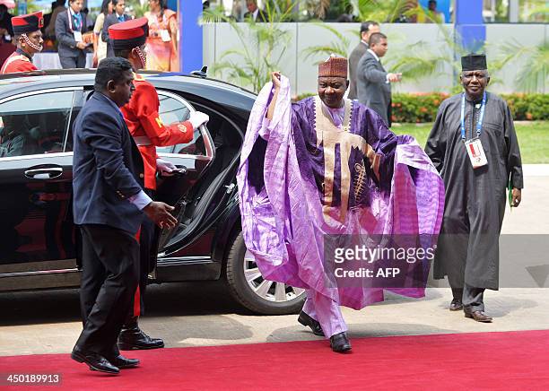Nigerian Vice-President Nnamdi Sambo smiles as he arrives for the final working session of the Commonwealth Heads of Government Meeting in Colombo on...
