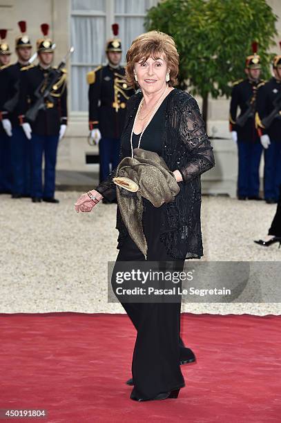 Edith Cresson arrives at the Elysee Palace for a State dinner in honor of Queen Elizabeth II, hosted by French President Francois Hollande as part of...