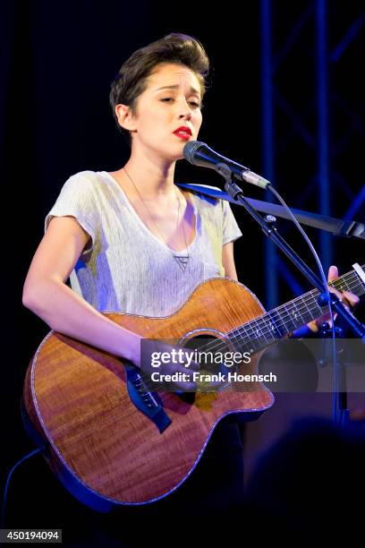 American singer Kina Grannis performs live during a concert at the Frannz on June 6, 2014 in Berlin, Germany.