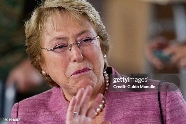 November 17: Presidential candidate for the New Majority coalition Michelle Bachelet casts her vote at the polls on November 17, 2013 in Santiago,...