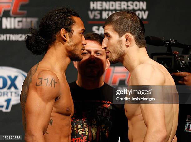 Opponents Benson Henderson and Rustam Khabilov face off during the UFC Fight Night weigh-in at Tingley Coliseum on June 6, 2014 in Albuquerque, New...