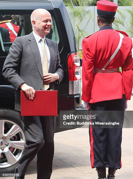 British Foreign Secretary William Hague arrives for the working session of the final day of the Commonwealth Heads of Government Meeting on November...