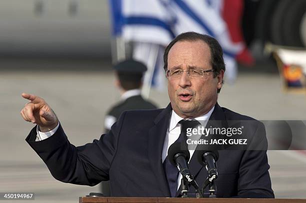 French President Francois Hollande delivers a speech upon his arrival at Ben Gurion International Airport in Tel Aviv on November 17, 2013 for a...