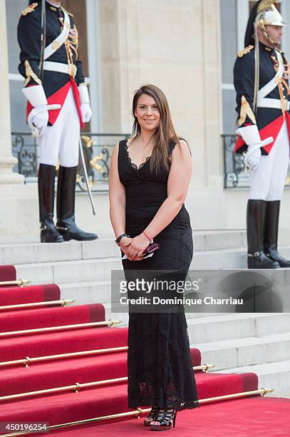 French tennis women Marion Bartoli arrives at the Elysee Palace for a State dinner in honor of Queen Elizabeth II, hosted by French President...