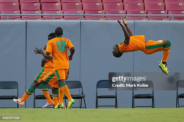 Emmanuel Mayuka of Zambia performs a bacflip as he celebrates a goal by Felix Katongo of Zambia during the International Friendly Match between Japan...